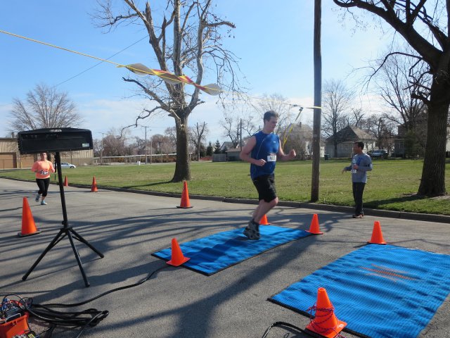A finish area scene as it happened in Hammond at the 10k/5k Charity Run.