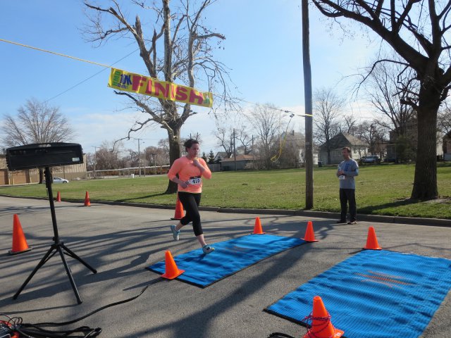 A finish area scene as it happened in Hammond at the 10k/5k Charity Run.