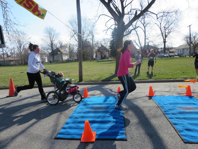 A finish area scene as it happened in Hammond at the 10k/5k Charity Run.