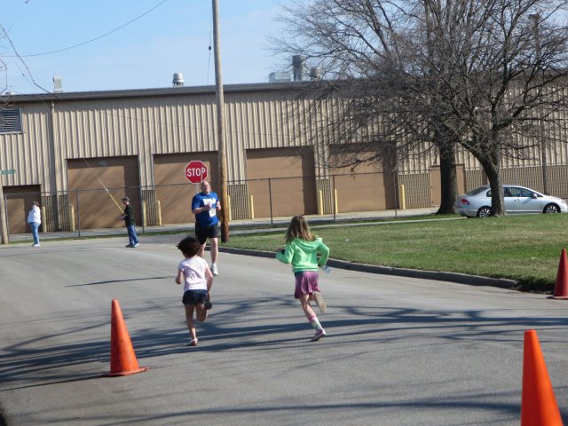A finish area scene as it happened in Hammond at the 10k/5k Charity Run.