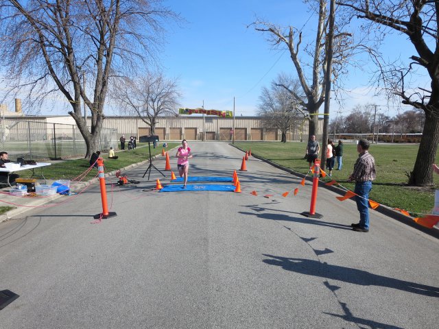 A finish area scene as it happened in Hammond at the 10k/5k Charity Run.
