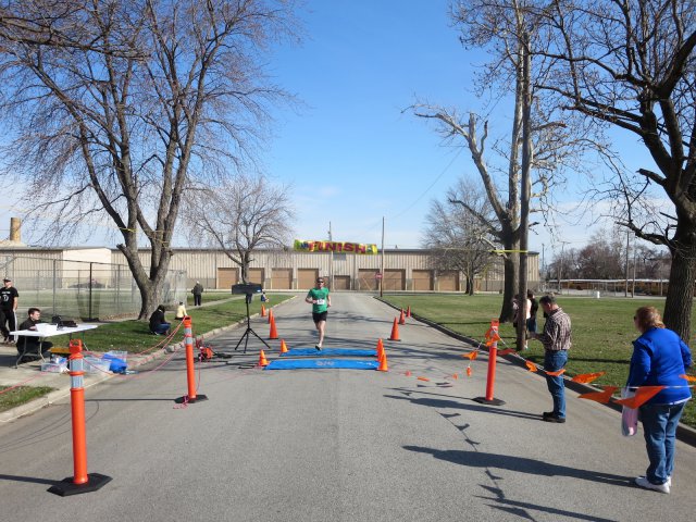 A finish area scene as it happened in Hammond at the 10k/5k Charity Run.