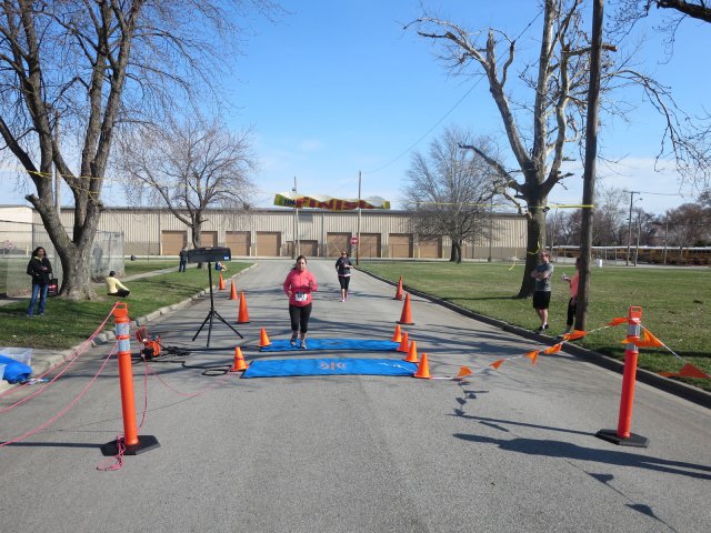 A finish area scene as it happened in Hammond at the 10k/5k Charity Run.