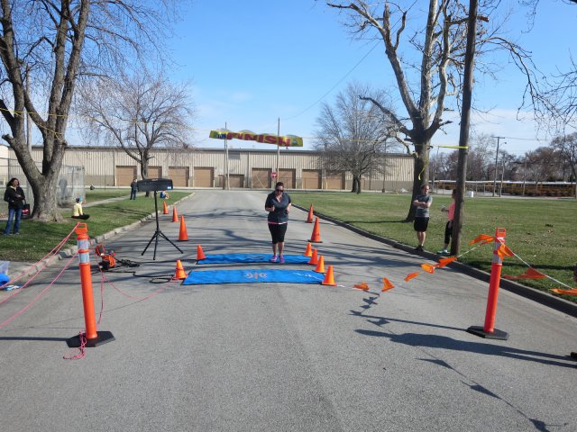 A finish area scene as it happened in Hammond at the 10k/5k Charity Run.