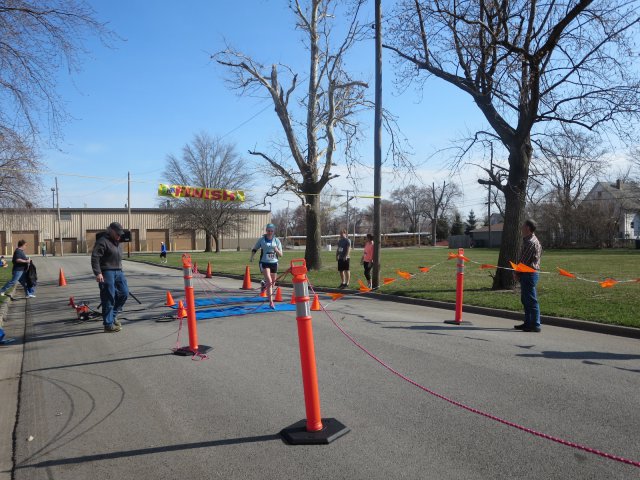 A finish area scene as it happened in Hammond at the 10k/5k Charity Run.