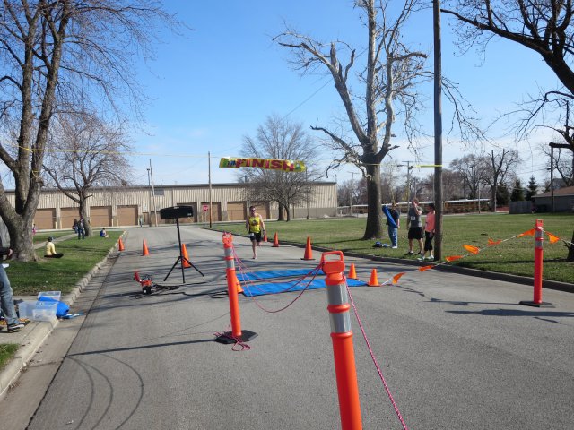 A finish area scene as it happened in Hammond at the 10k/5k Charity Run.