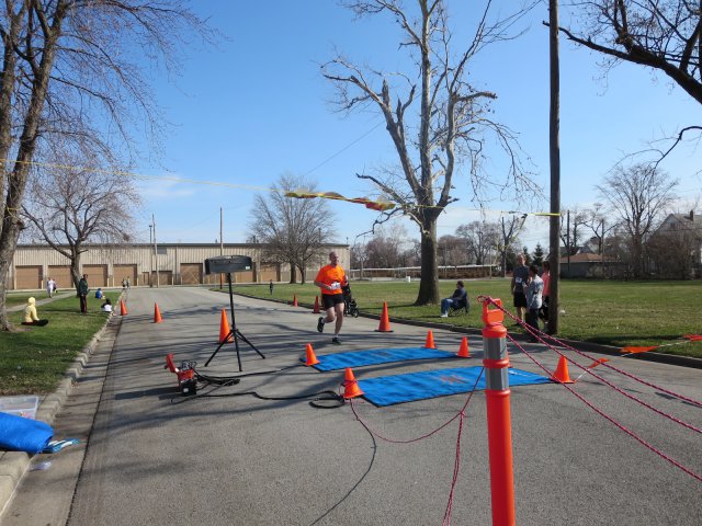 A finish area scene as it happened in Hammond at the 10k/5k Charity Run.