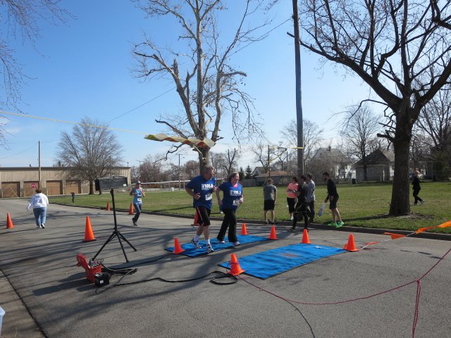 A finish area scene as it happened in Hammond at the 10k/5k Charity Run.