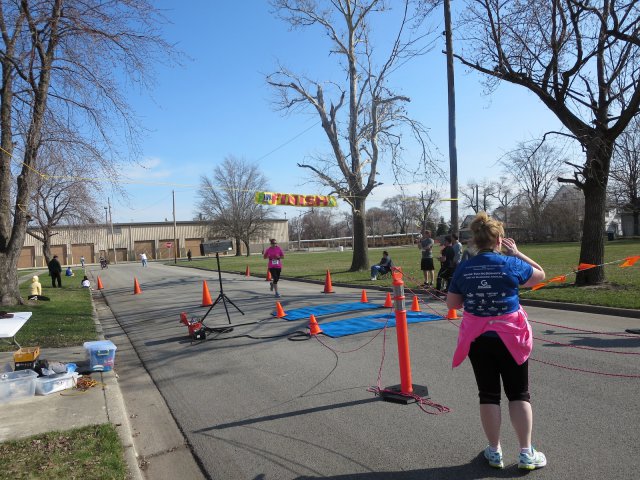 A finish area scene as it happened in Hammond at the 10k/5k Charity Run.