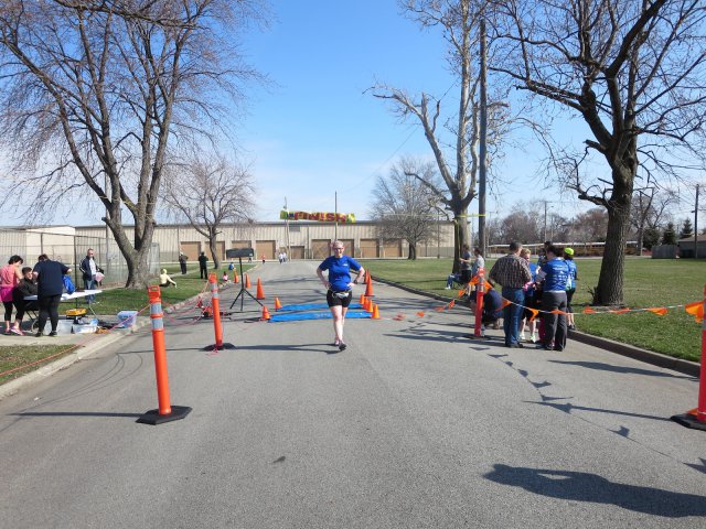 A finish area scene as it happened in Hammond at the 10k/5k Charity Run.