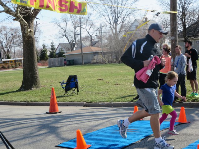 A finish area scene as it happened in Hammond at the 10k/5k Charity Run.