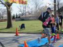 A finish area scene as it happened in Hammond at the 10k/5k Charity Run.