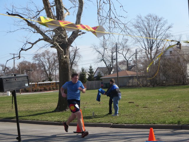 A finish area scene as it happened in Hammond at the 10k/5k Charity Run.