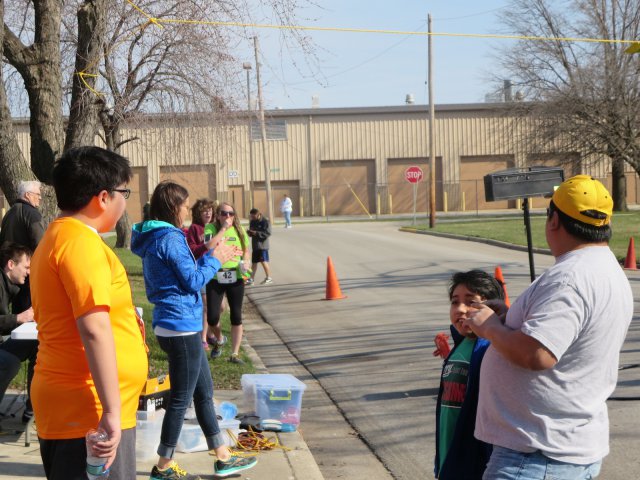 A finish area scene as it happened in Hammond at the 10k/5k Charity Run.