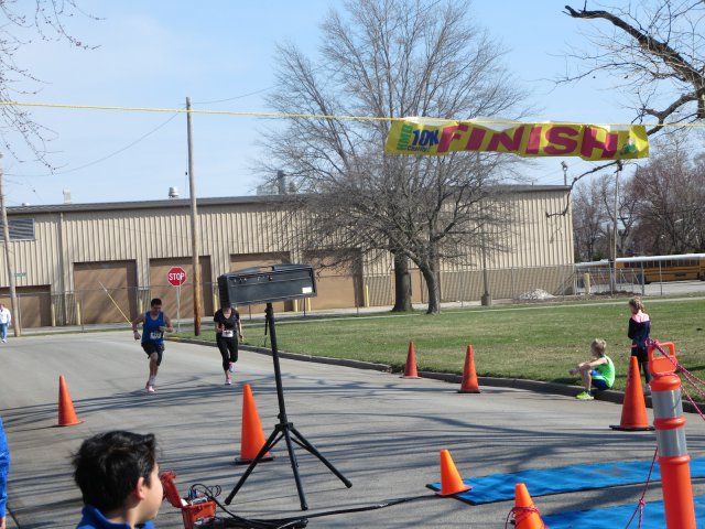 A finish area scene as it happened in Hammond at the 10k/5k Charity Run.