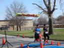 A finish area scene as it happened in Hammond at the 10k/5k Charity Run.