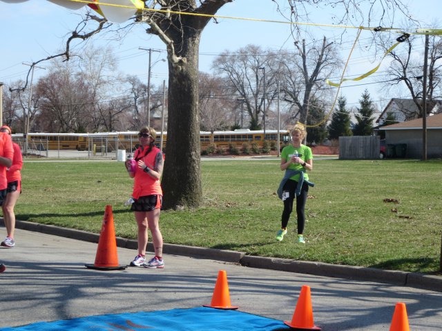 A finish area scene as it happened in Hammond at the 10k/5k Charity Run.