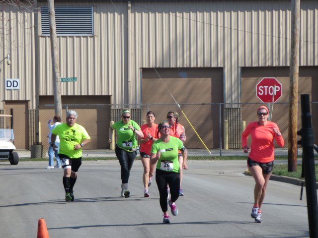 A finish area scene as it happened in Hammond at the 10k/5k Charity Run.