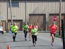 A finish area scene as it happened in Hammond at the 10k/5k Charity Run.