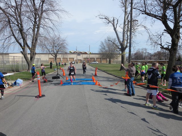 A finish area scene as it happened in Hammond at the 10k/5k Charity Run.