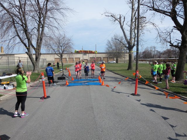 A finish area scene as it happened in Hammond at the 10k/5k Charity Run.