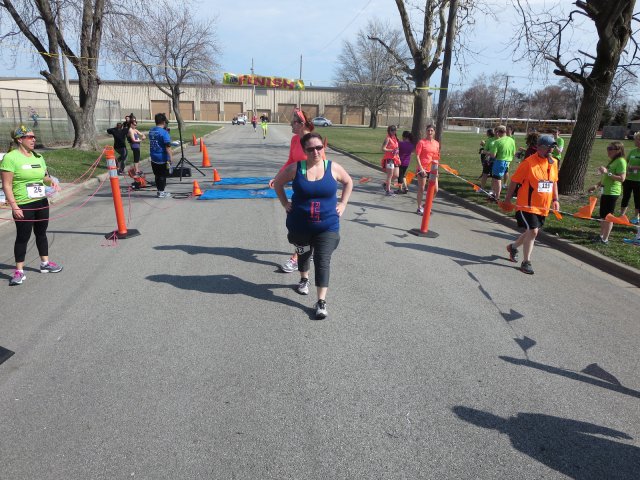 A finish area scene as it happened in Hammond at the 10k/5k Charity Run.