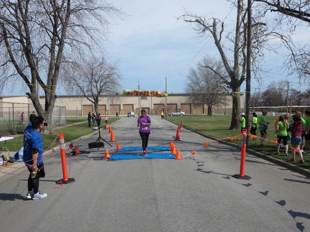A finish area scene as it happened in Hammond at the 10k/5k Charity Run.