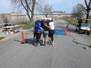 A finish area scene as it happened in Hammond at the 10k/5k Charity Run.