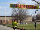 A finish area scene as it happened in Hammond at the 10k/5k Charity Run.