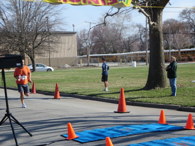 A finish area scene as it happened in Hammond at the 10k/5k Charity Run.