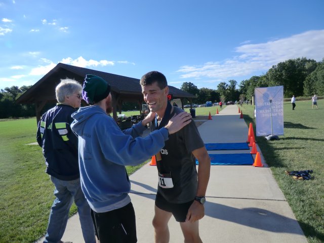 Crazy Legs Half Marathon Champion, Brent Ksenak Hits the Finish Line