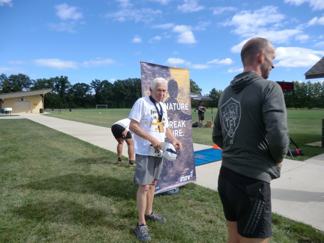Raucous Applause Greets Final Finisher, Scott Rains, 75 of Portage, Indiana!