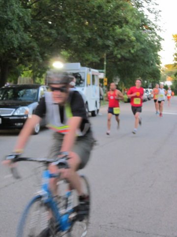 5-Km runners complete their first lap on course