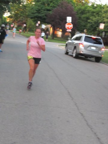 5-Km runners complete their first lap on course
