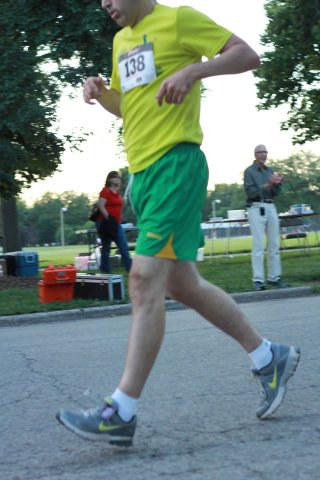 5-Km runners complete their first lap on course