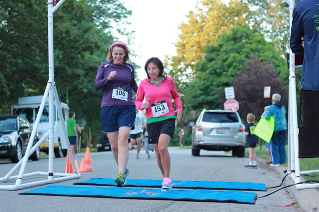After orbiting our Full Moon course 1-mile runners make thier finish line