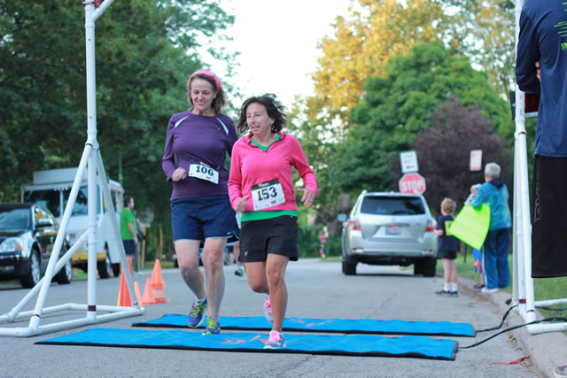 After orbiting our Full Moon course 1-mile runners make thier finish line