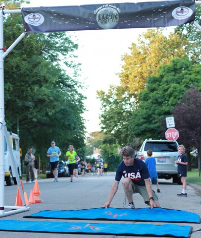 After orbiting our Full Moon course 1-mile runners make thier finish line