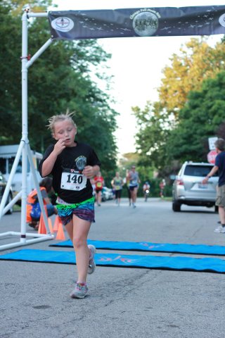 After orbiting our Full Moon course 1-mile runners make thier finish line