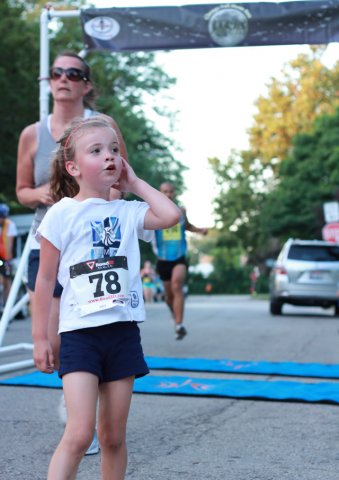 After orbiting our Full Moon course 1-mile runners make thier finish line