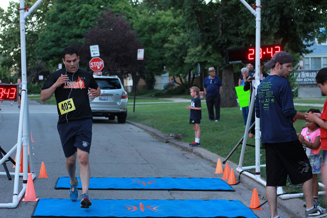 Completely despekled of mud... Jake Traunfeld finishes his Chicago Full Moon 5-Km