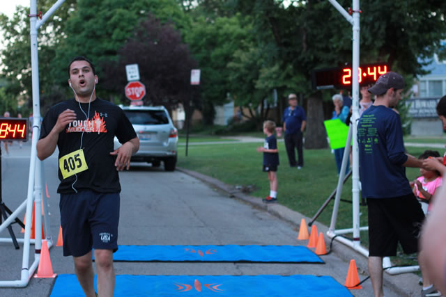 Completely despekled of mud... Jake Traunfeld finishes his Chicago Full Moon 5-Km