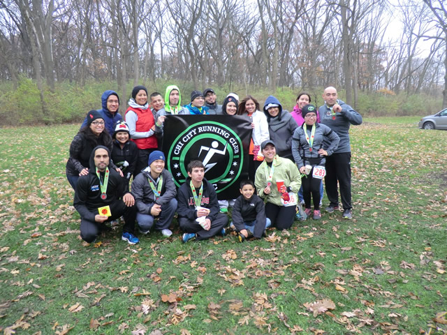 A triumphant photo-op for Chi City Running Club at Paleozoic Trail Runs - Carboniferous Fall!