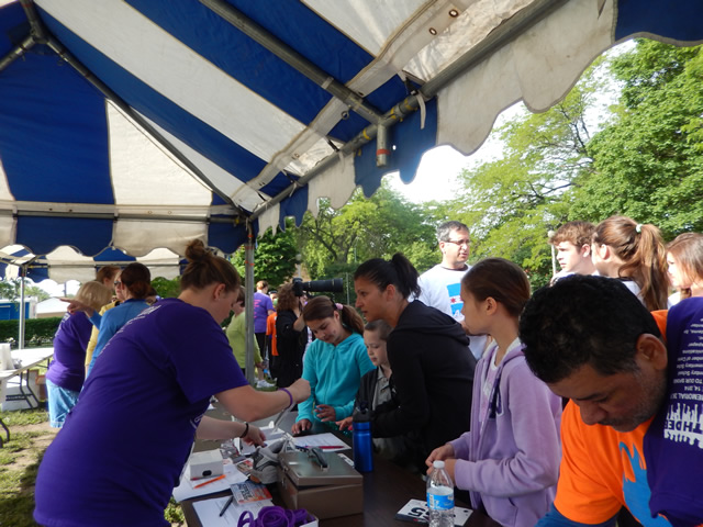 Volunteers Manage Runner Registration and Check-in : Saturday June 14th, 2014