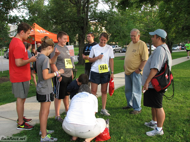 Pre-race gathering of runners and volunteers