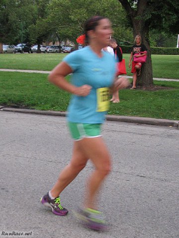 Runners of the 5-Km complete their first lap
