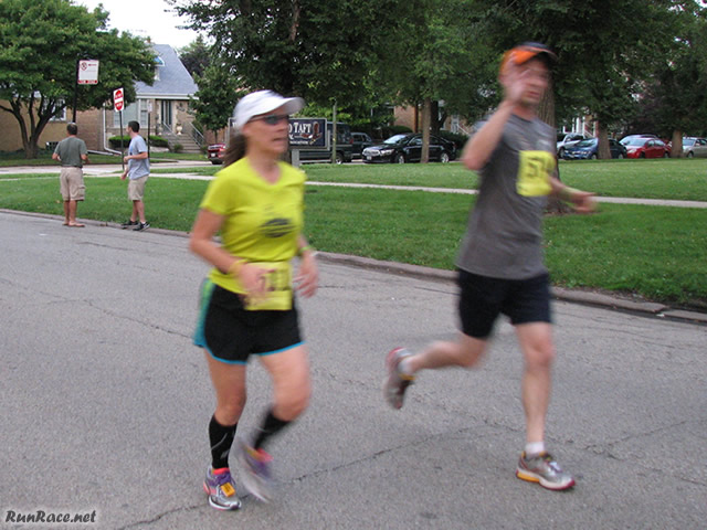 Runners of the 5-Km complete their first lap