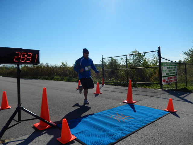 Action from the Finish Line of Hoosier Burn Camp 5K Run : Saturday October 4, 2014