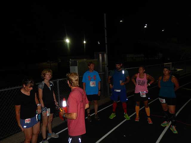 A surge in action as night time runners take to the track.