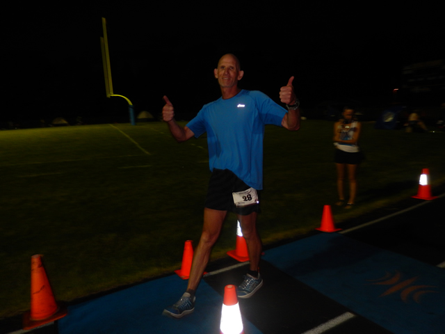 A surge in action as night time runners take to the track.